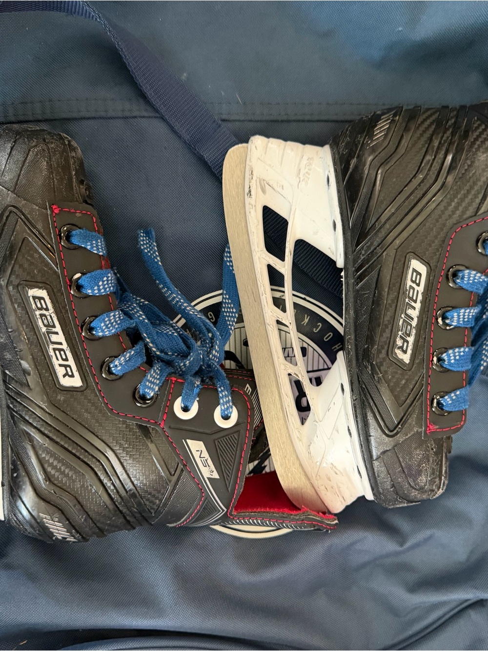 Bauer kids Black Ice Hockey Skates size 1-1.5 with Blue Laces